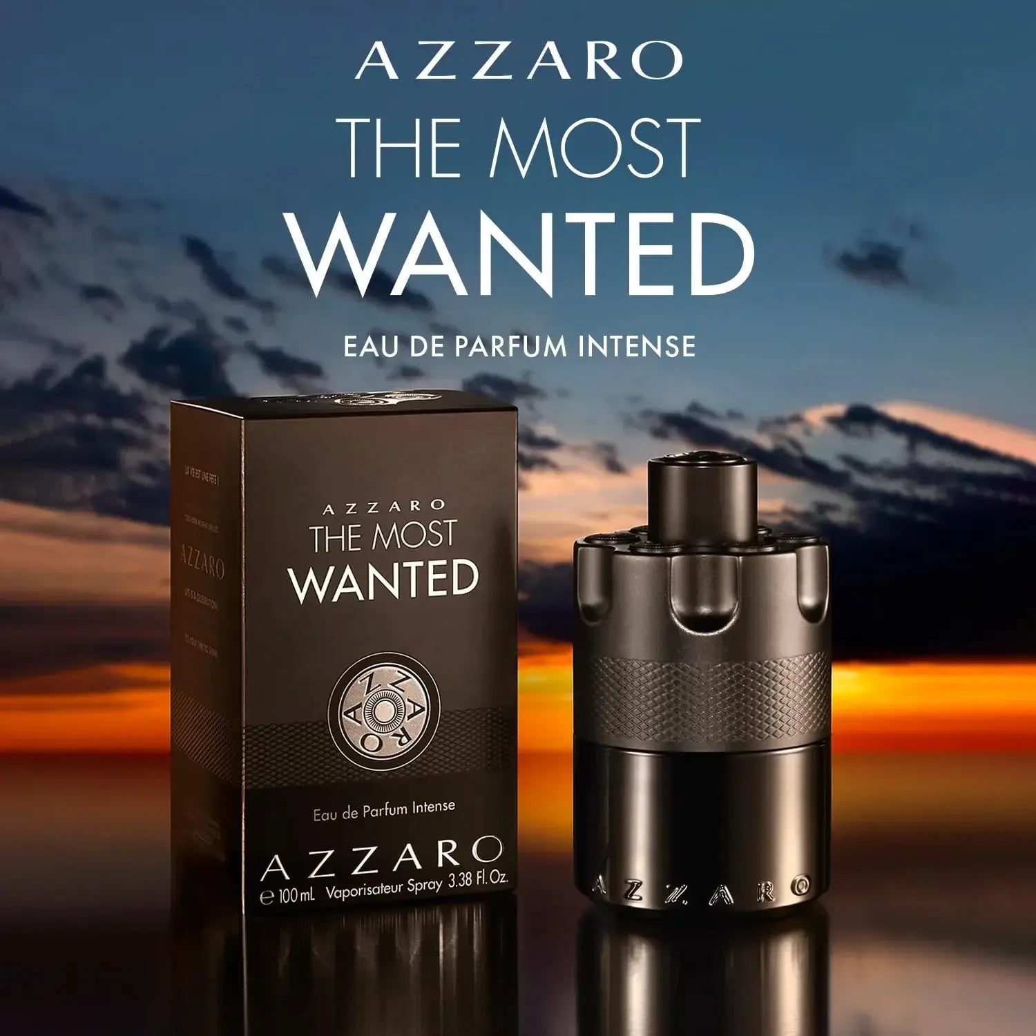 Azzaro The Most Wanted perfume bottle and packaging with a mountainous background