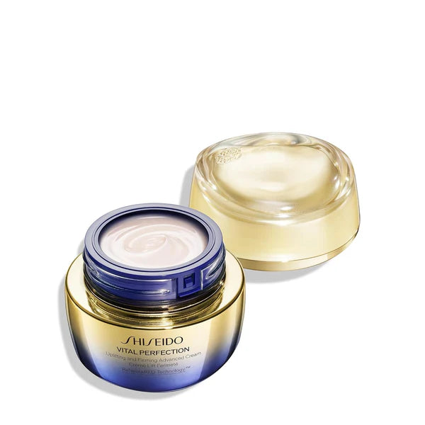 Shiseido Vital Perfection cream jar with open lid on a white background