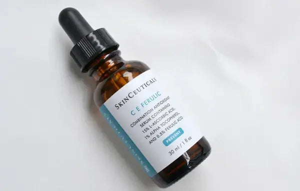 SkinCeuticals CE Ferulic bottle with dropper on a light gray background