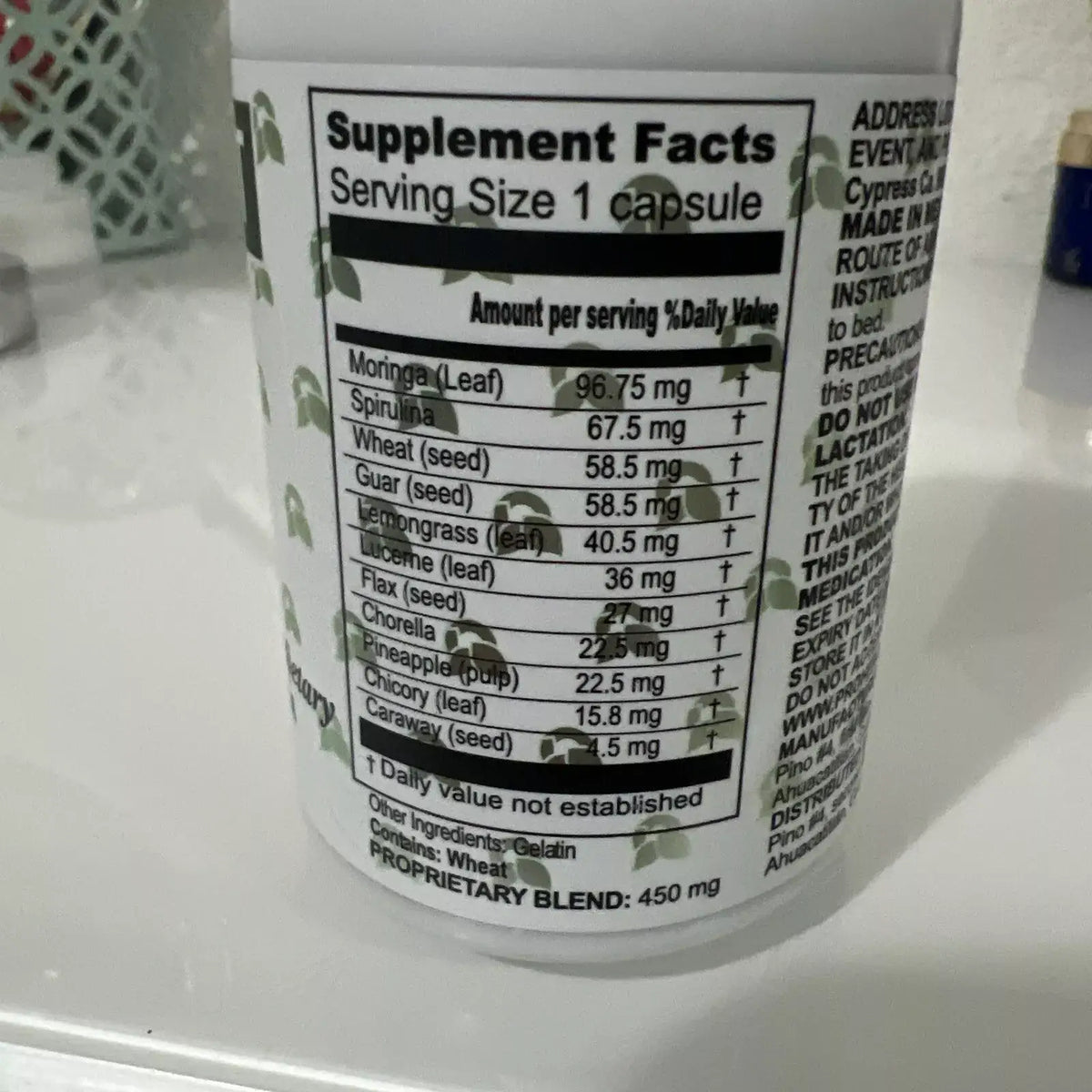 Close-up of supplement facts on Proher Natura F-Vit herbal weight loss product bottle.
